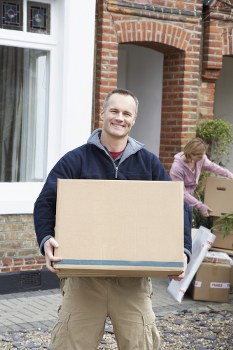 Removal team planning a move in Kennington on a residential street
