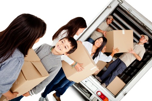Professional packing service preparing boxes for a Kennington home move