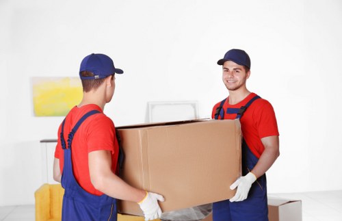 Careful wrapping and labelling of household items during a local move