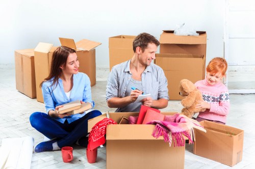 Careful packing of household items for a Kennington removal service