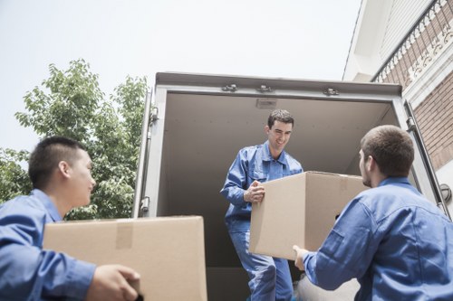 Removalists transporting household items during a local move