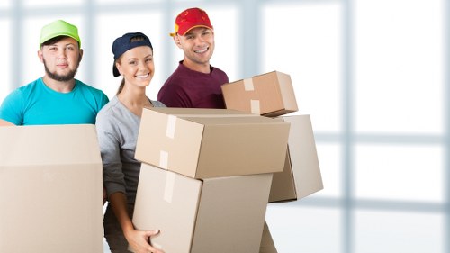 Local removals crew working carefully in a Kennington property