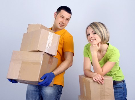 Local removals vehicle and movers handling a Kennington property move