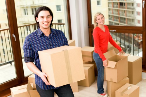 Mover wearing PPE while protecting property during loading